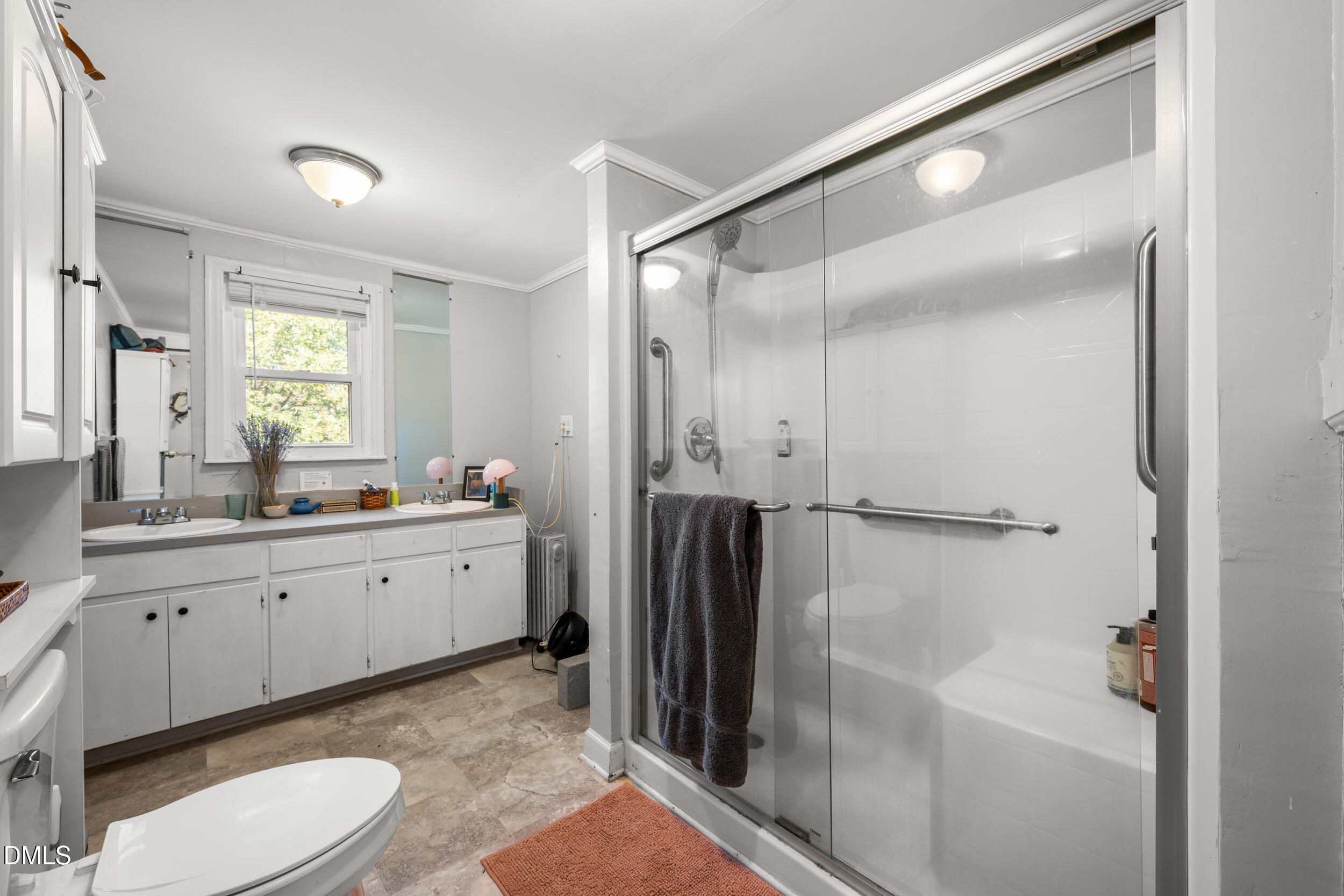 2707 Moorefields Road Hillsborough, NC 27278 - Photo 10 of 36 a bathroom with a granite countertop sink toilet and shower