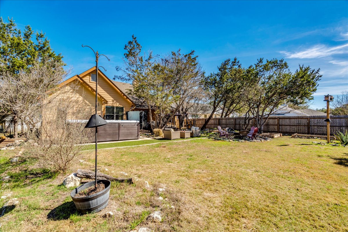 11 Rhapsody Lane Wimberley, TX 78676 - Photo 28 of 35 a backyard of a house