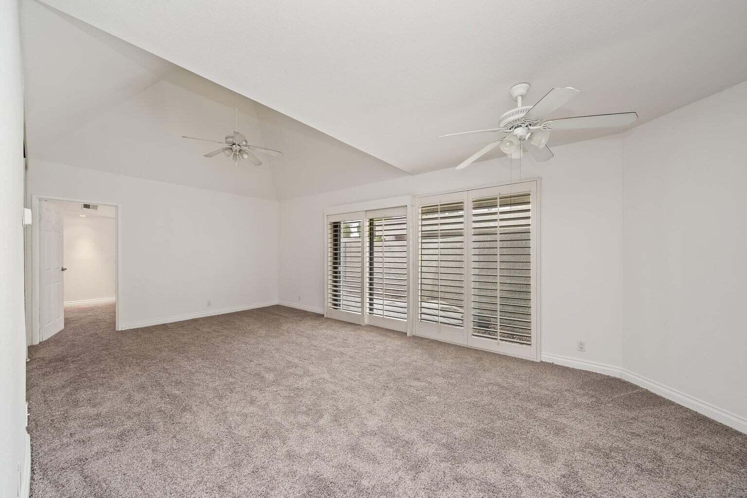 71861 Eleanora Lane Rancho Mirage, CA 92270 - Photo 5 of 22 an empty room with windows