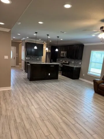 a large room with wooden floor