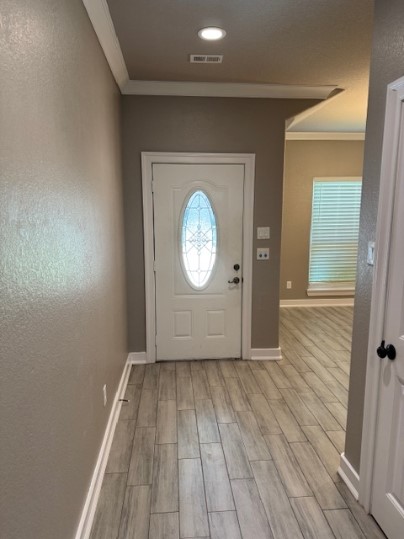 611 Foxmeadows Lane Cleveland, TX 77327 - Photo 7 of 13 an empty room with wooden floor and a window