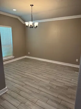 a view of a room with an empty space