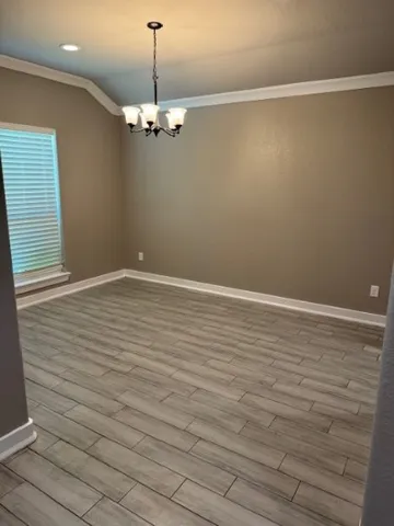 a view of a room with an empty space