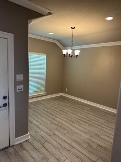 611 Foxmeadows Lane Cleveland, TX 77327 - Photo 10 of 13 an empty room with wooden floor mirror and windows