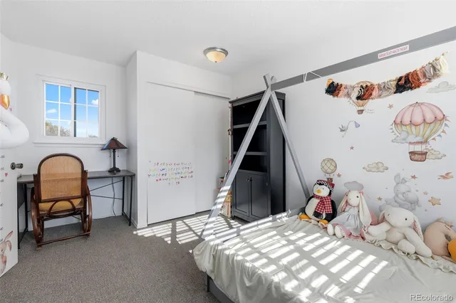 a view of a livingroom from a hallway