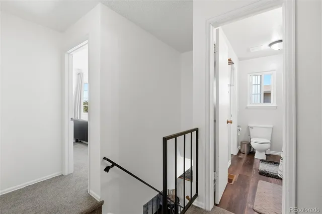 a kitchen with stainless steel appliances granite countertop a stove and a refrigerator