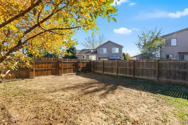 a view of an outdoor sitting area with furniture