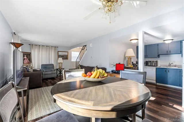 a kitchen with a white cabinets and white appliances