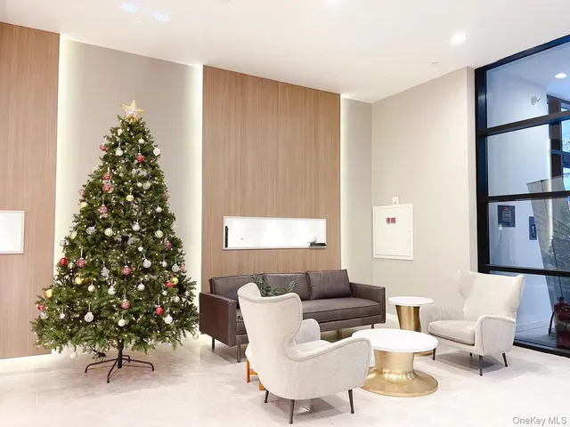 a room with table and a large mirror