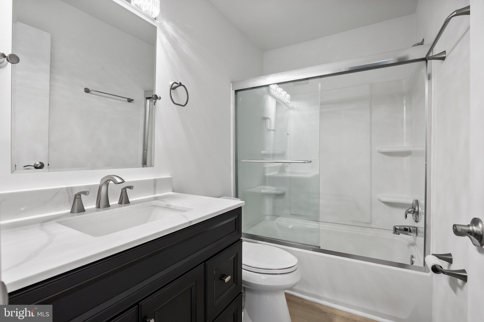 4912 B Dunbarton Road Mount Laurel, NJ 08054 - Photo 19 of 21 a bathroom with a sink a toilet and shower