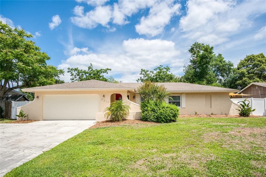 2217 Sussex Road Winter Park, FL 32792 - Photo 1 of 1 a front view of a house with garden