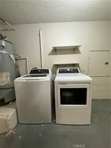 a stove top oven sitting inside of a kitchen
