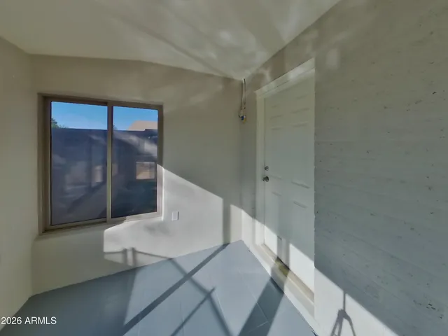 a bathroom with a toilet sink a shower and mirror