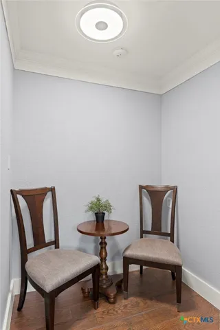 a view of a workspace with furniture