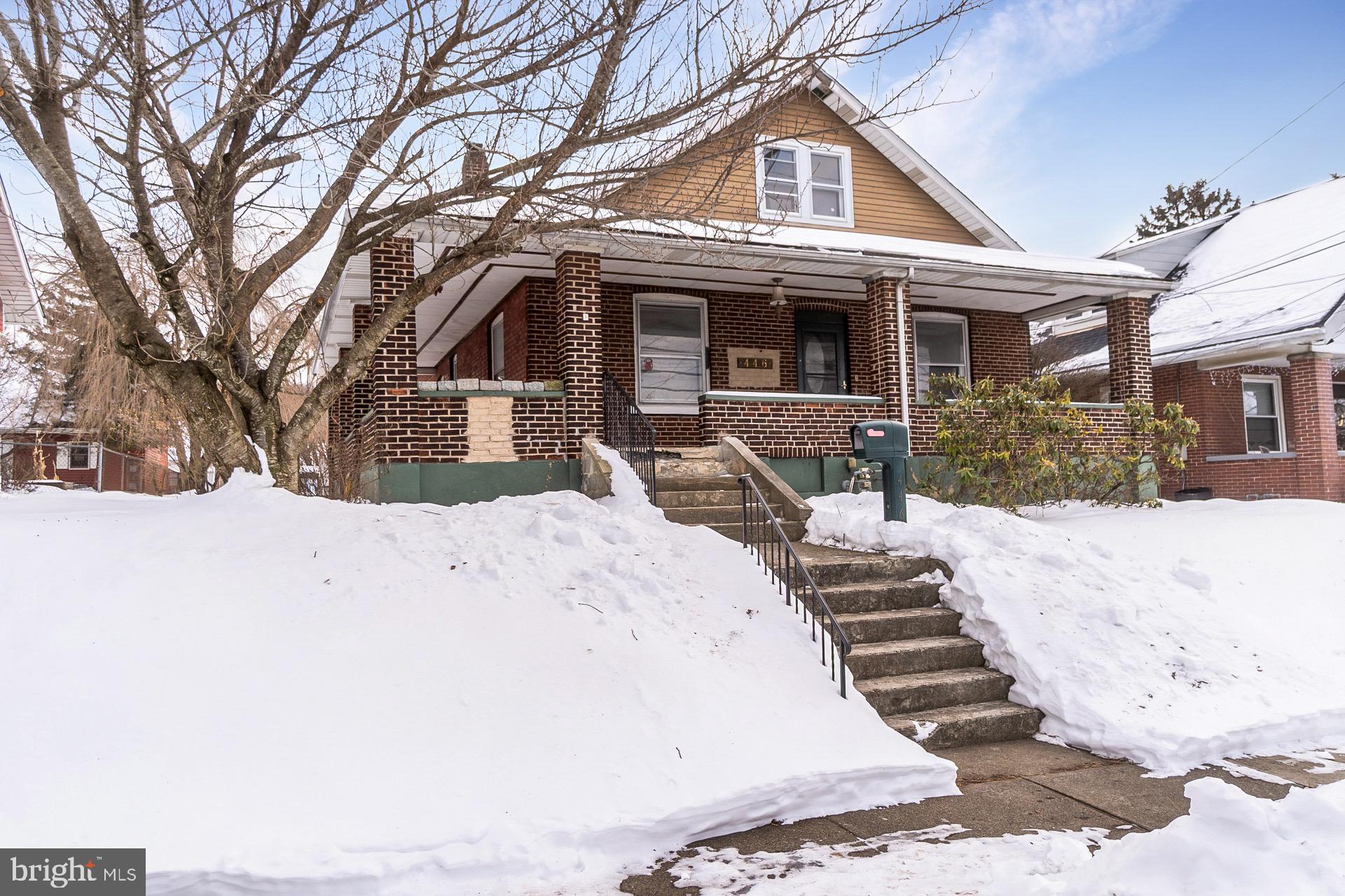 446 Williams Street Easton, PA 18042 - Photo 2 of 37 a view of a white house with a large tree