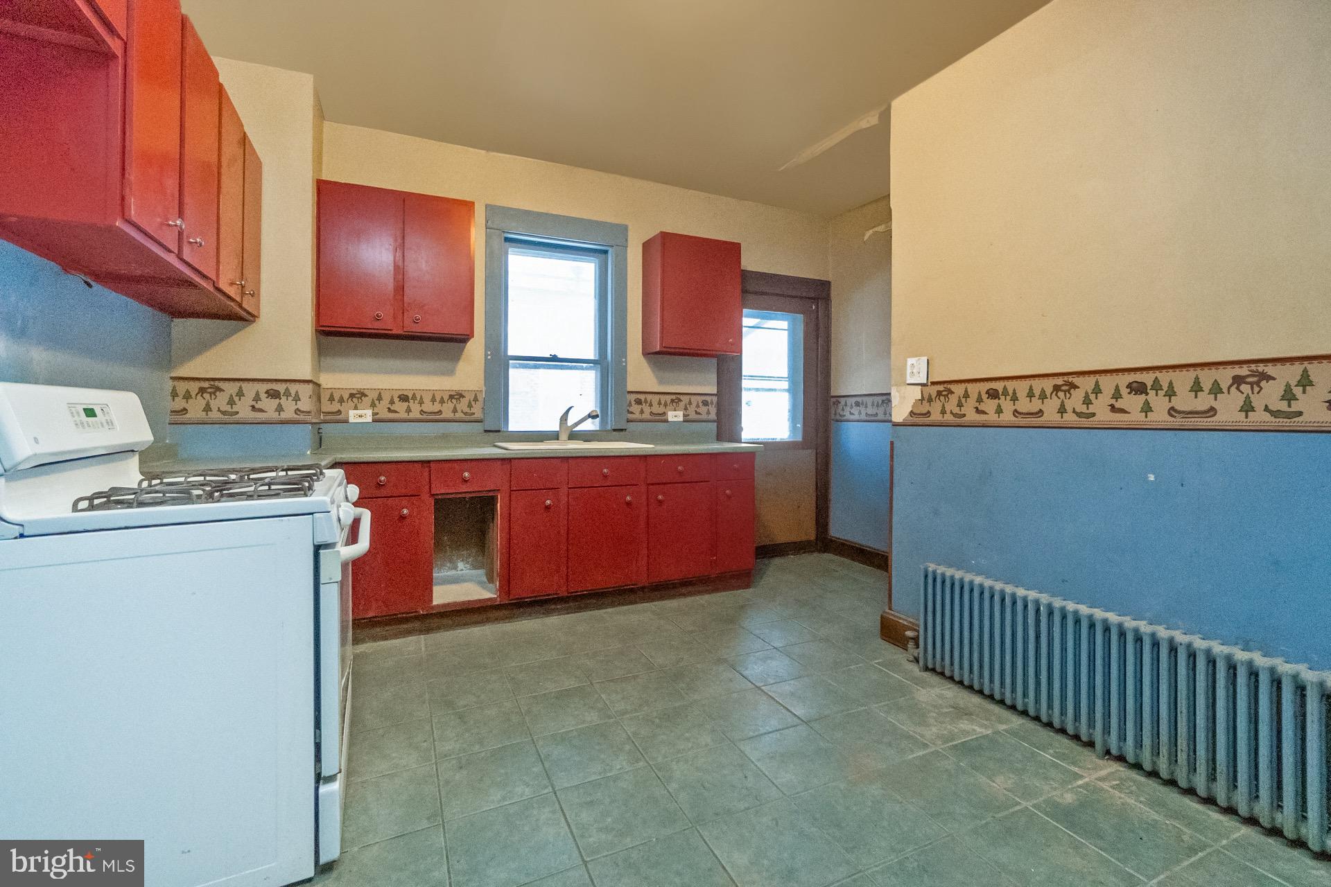 446 Williams Street Easton, PA 18042 - Photo 8 of 37 a view of a kitchen with utility room and utility room