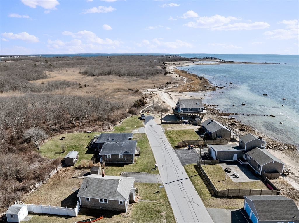 7 Silver Shell Beach Drive Fairhaven, MA 02719 - Photo 26 of 35 an aerial view of multiple houses with yard