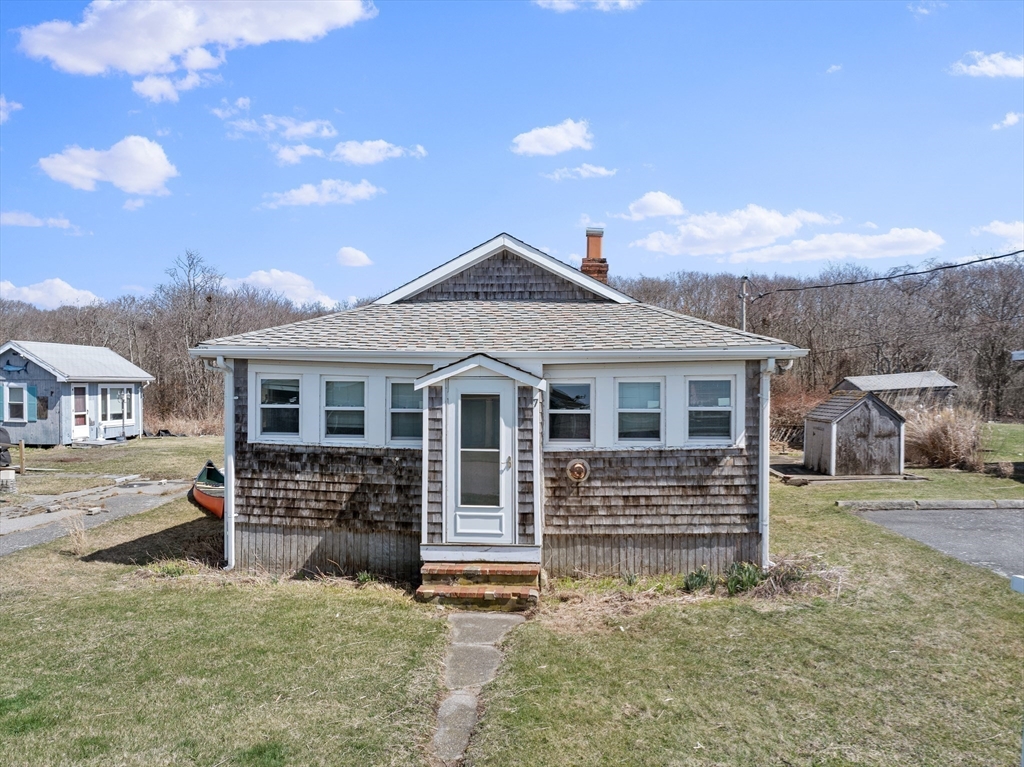 7 Silver Shell Beach Drive Fairhaven, MA 02719 - Photo 3 of 35 front view of a house with a yard