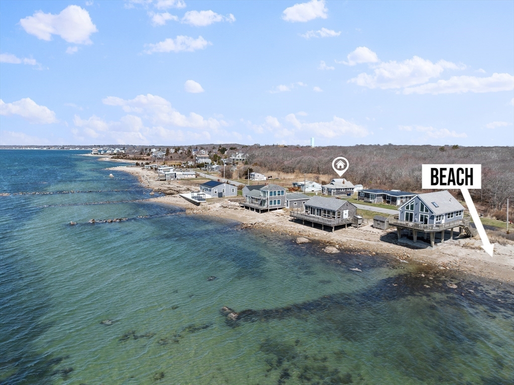 7 Silver Shell Beach Drive Fairhaven, MA 02719 - Photo 4 of 35 a view of a terrace with lawn chairs