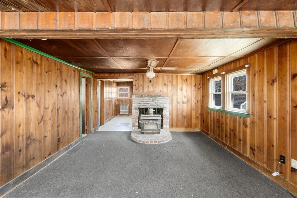 7 Silver Shell Beach Drive Fairhaven, MA 02719 - Photo 8 of 35 a view of a porch with wooden floor