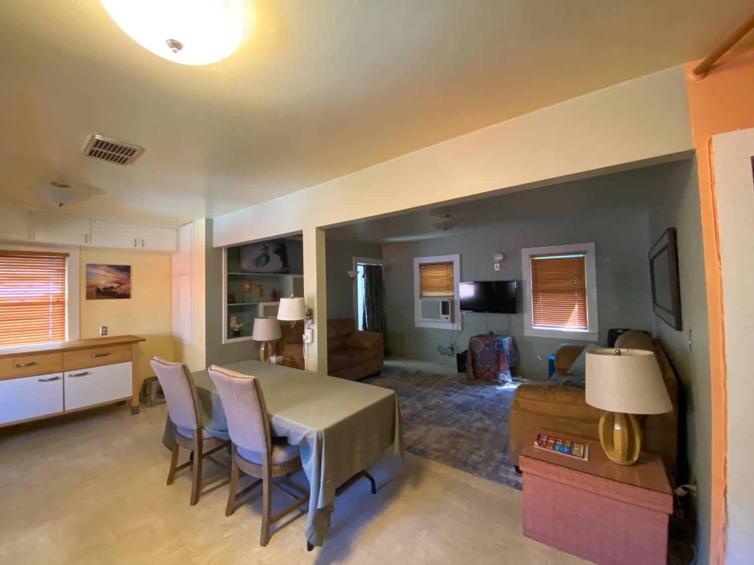 14105 River Road Walnut Grove, CA 95690 - Photo 21 of 41 a living room with furniture and a flat screen tv