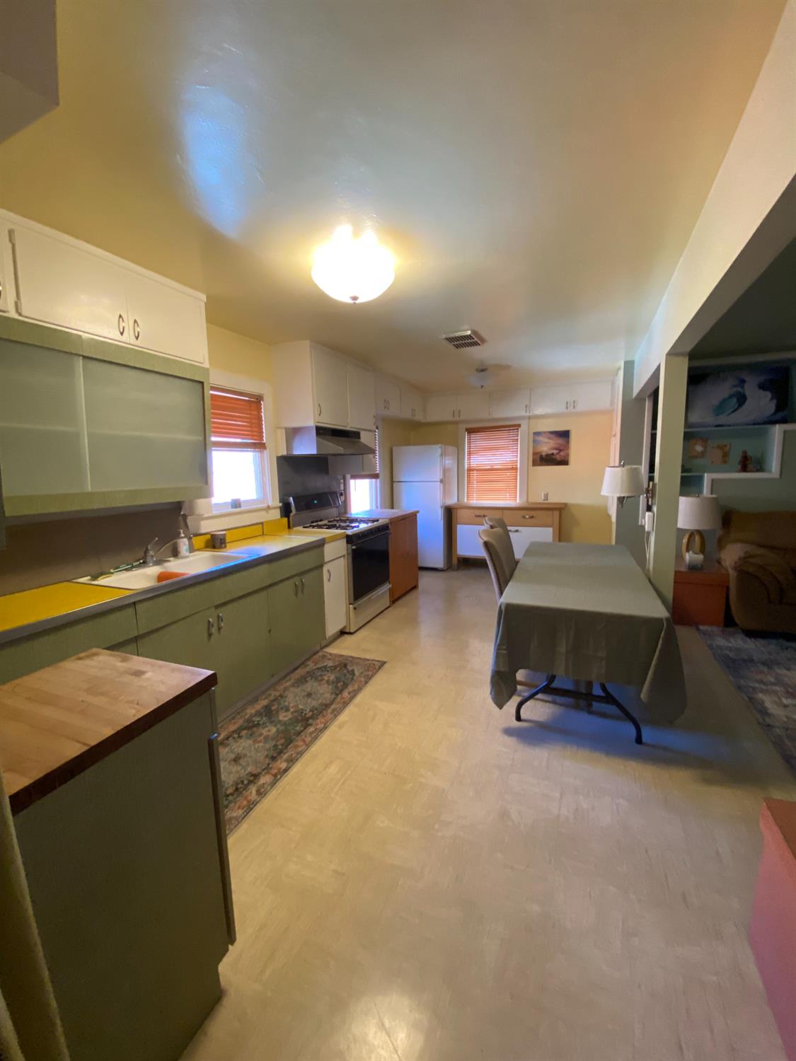 14105 River Road Walnut Grove, CA 95690 - Photo 28 of 41 a bedroom with furniture and a flat screen tv