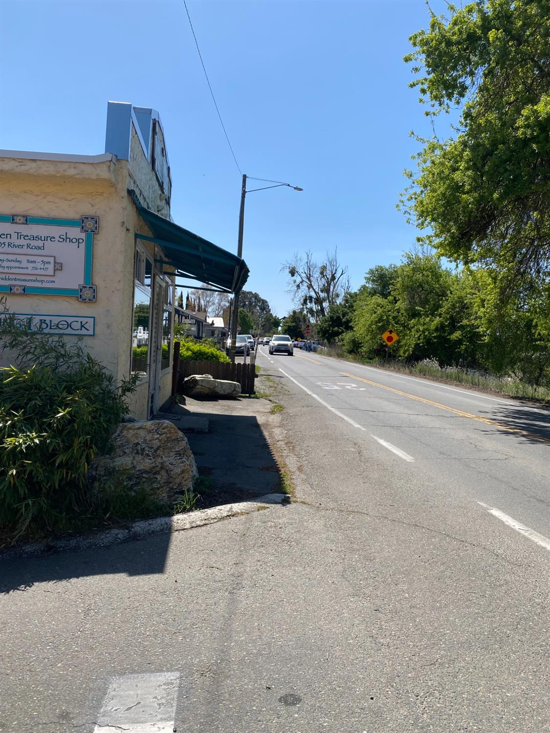 14105 River Road Walnut Grove, CA 95690 - Photo 6 of 41 a car parked on the side of the road