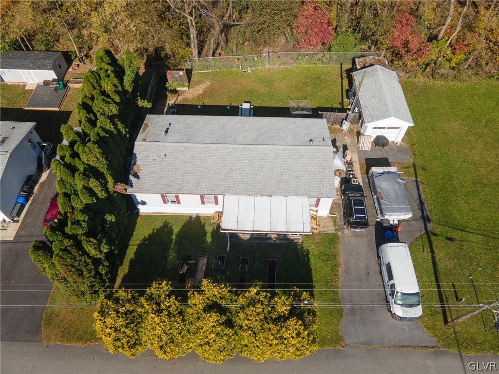 517 Norman Road Nazareth, PA 18064 - Photo 8 of 11 an aerial view of a house with a yard and a large tree