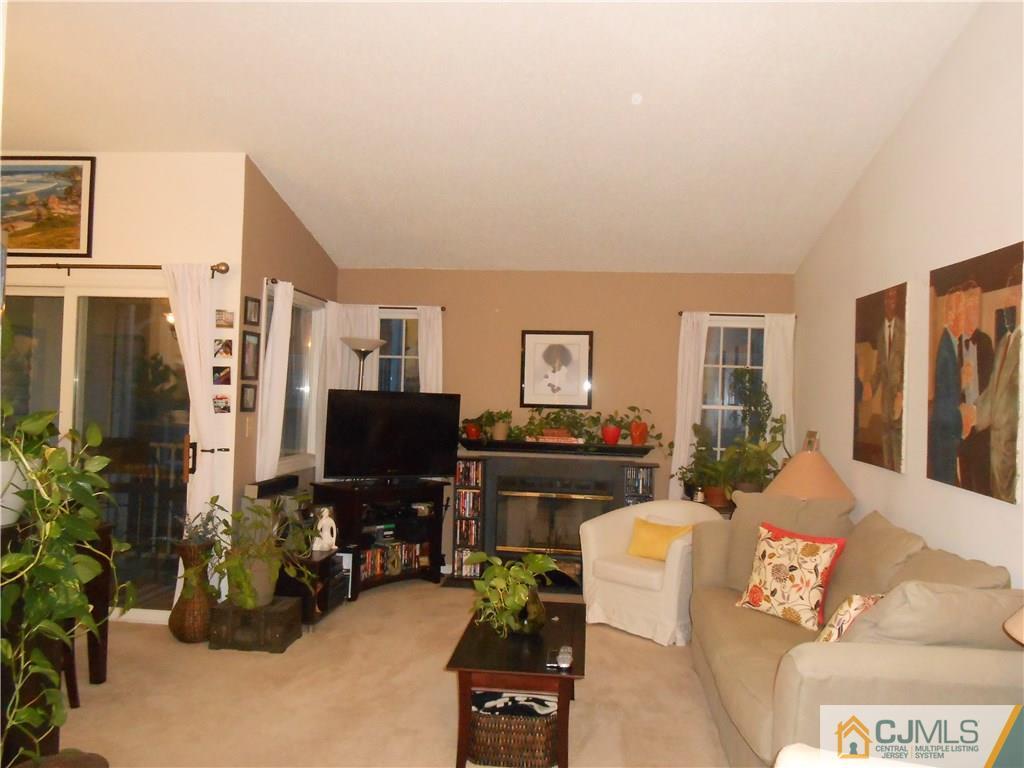 331 Edpas Road New Brunswick, NJ 08901 - Photo 2 of 15 a living room with furniture and a flat screen tv