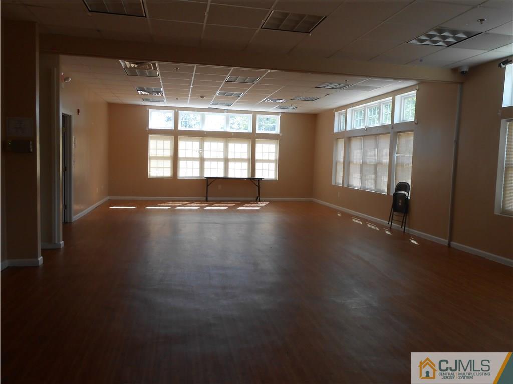 331 Edpas Road New Brunswick, NJ 08901 - Photo 13 of 15 a view of room with window and wooden floor