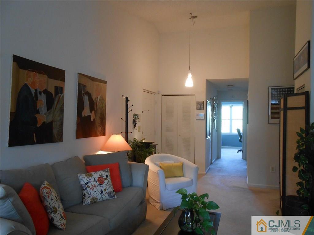 331 Edpas Road New Brunswick, NJ 08901 - Photo 4 of 15 a living room with furniture and a lamp