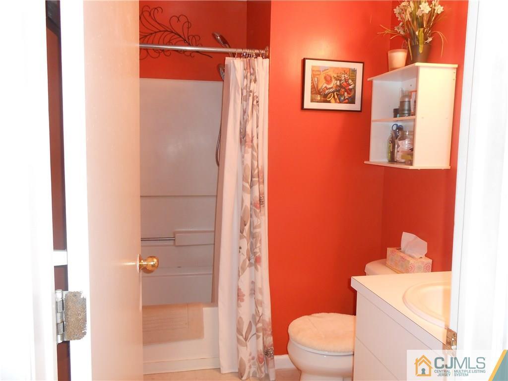 331 Edpas Road New Brunswick, NJ 08901 - Photo 7 of 15 a bathroom with a toilet and shower