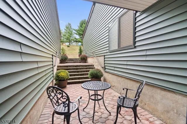 a porch with seating space
