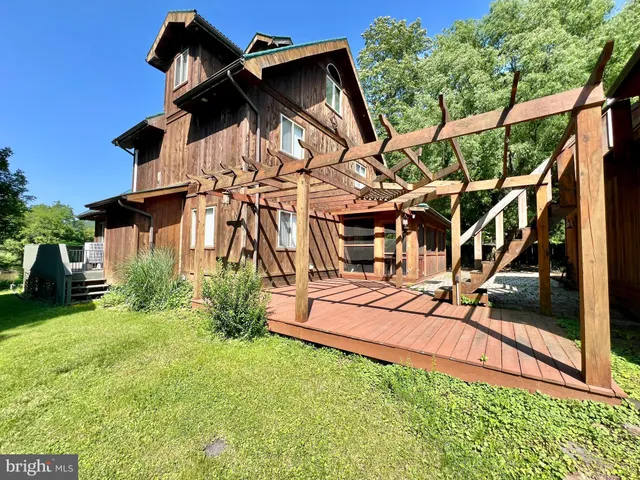 a view of a lounge chairs in the patio