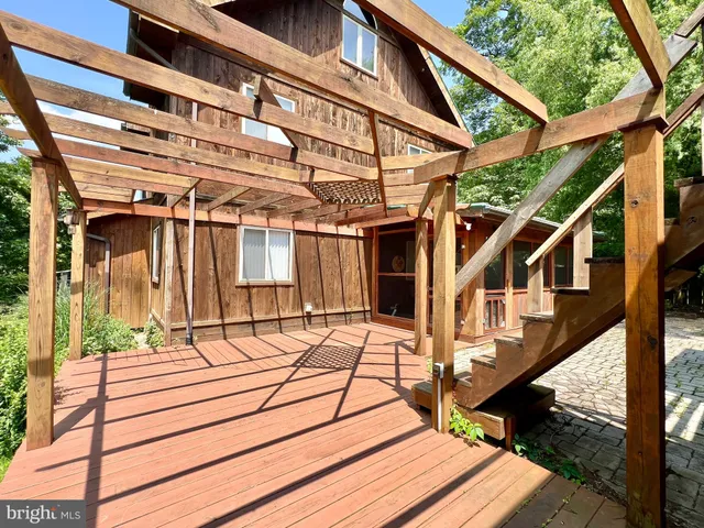 a living room filled with furniture and a table
