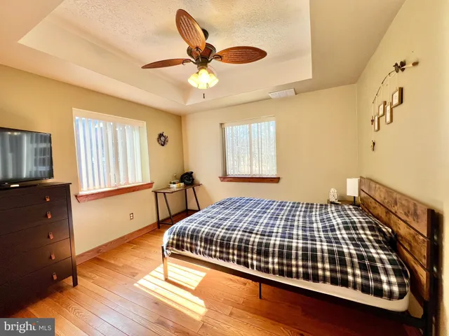 a view of a livingroom with furniture and window