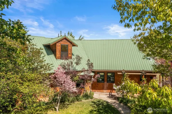 a backyard of a house with lots of green space