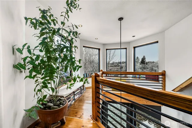 a sitting area with furniture and potted plant