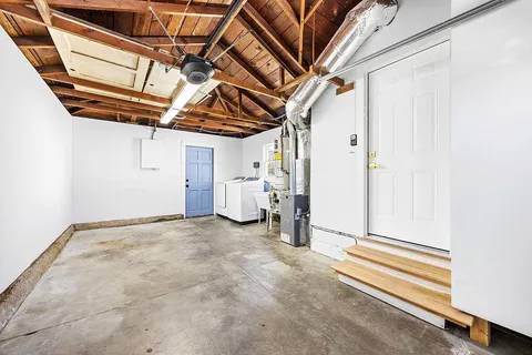 a view of a room with wooden walls