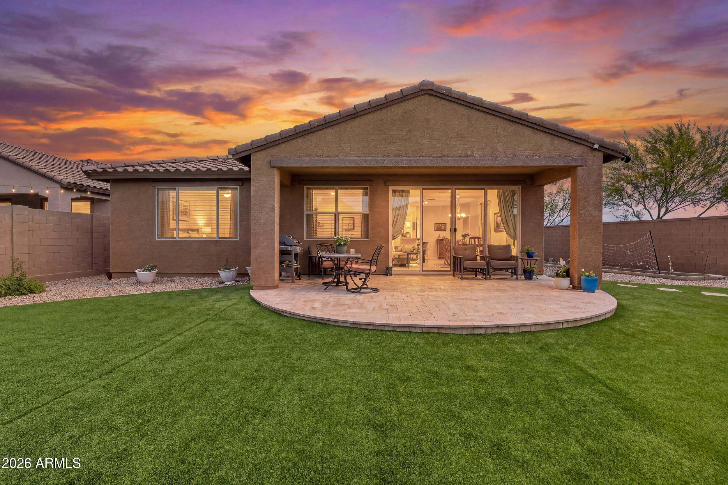 12330 East Soloman Road Gold Canyon, AZ 85118 - Photo 2 of 69 a backyard of a house with table and chairs