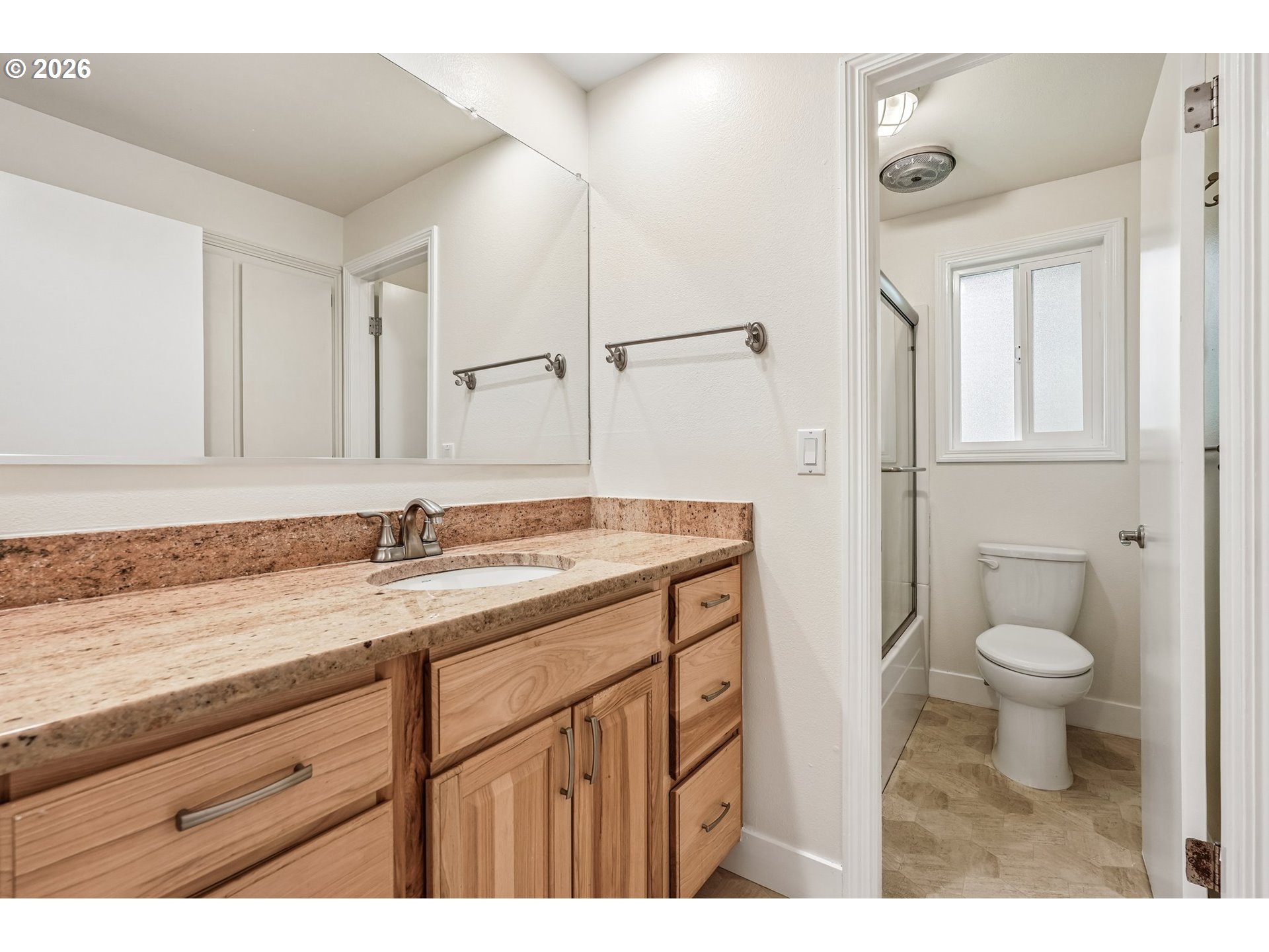 22600 Northeast 28th Street Camas, WA 98607 - Photo 22 of 48 a bathroom with a granite countertop sink toilet and shower