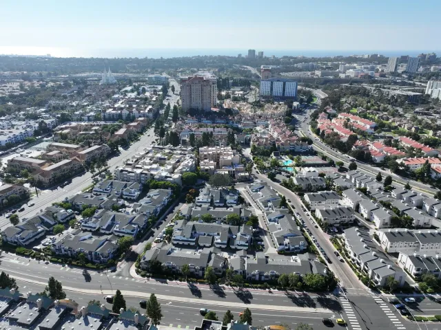 a view of a city with tall buildings