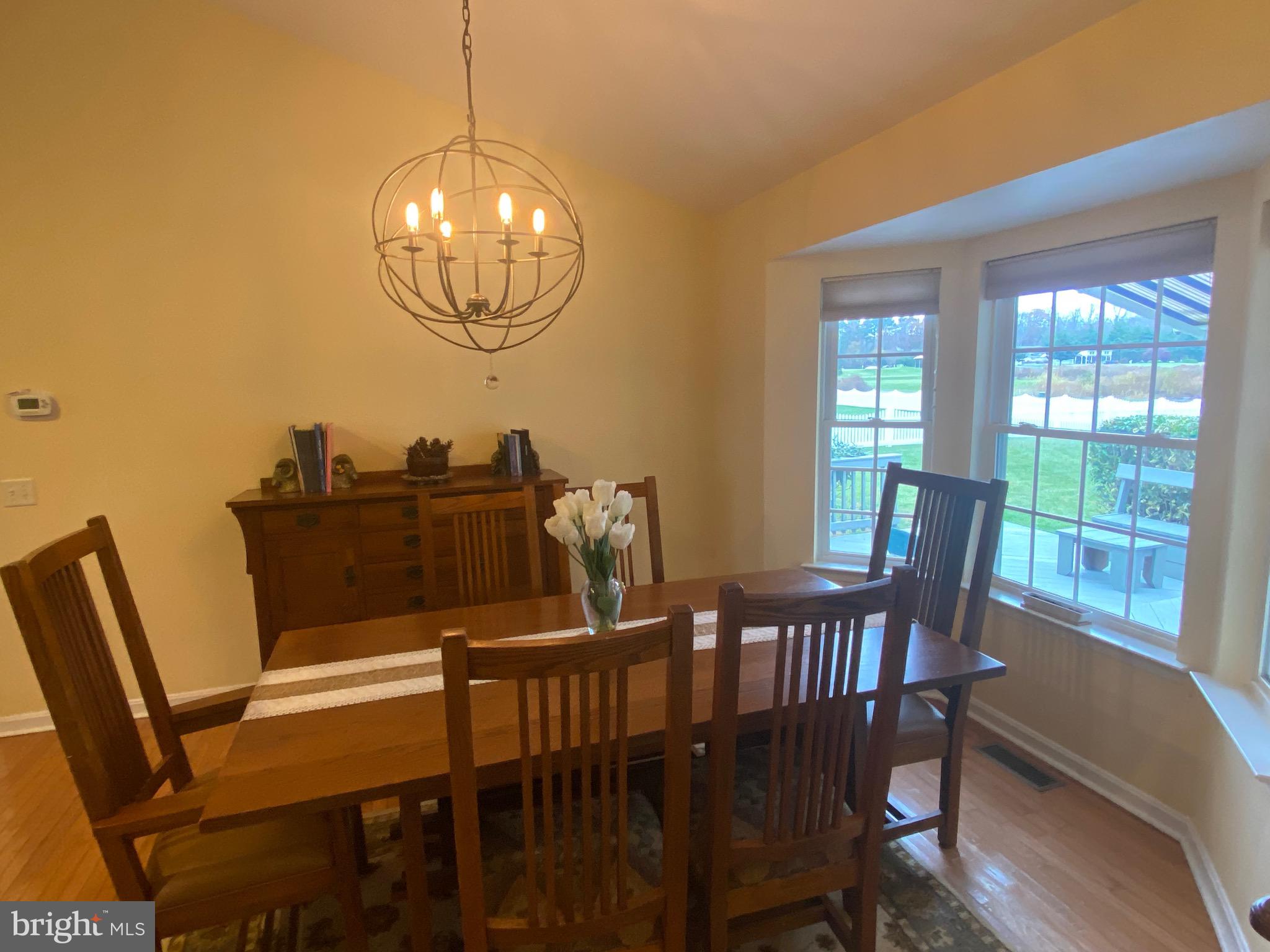13 Fairway Avenue Georgetown, DE 19947 - Photo 20 of 37 a view of a dining room with furniture window and wooden floor