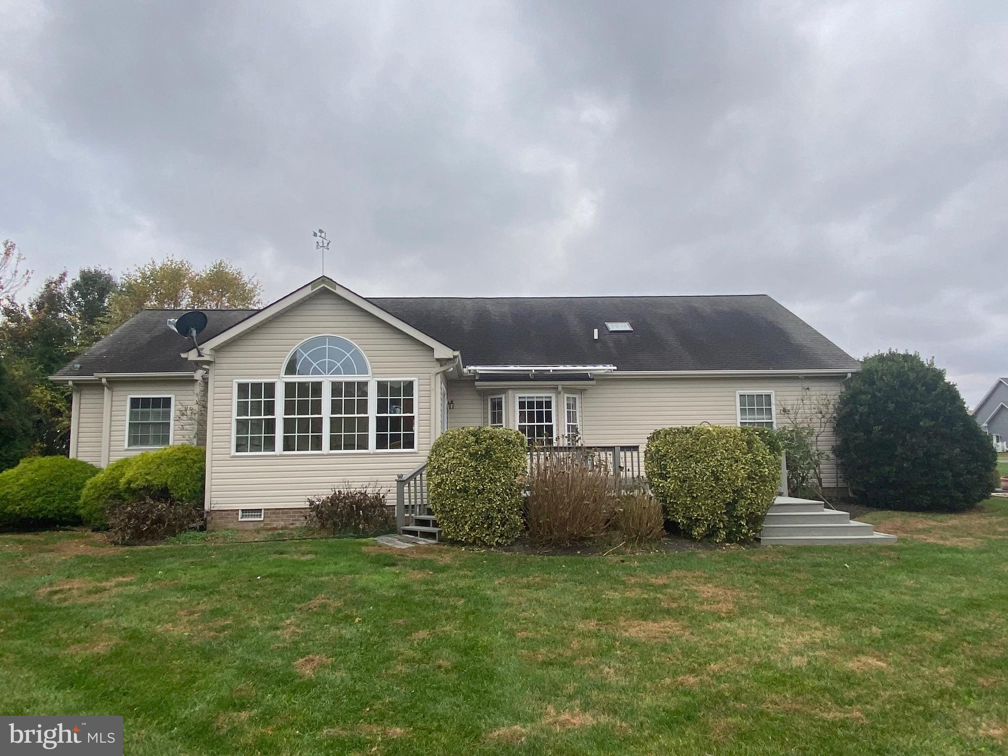 13 Fairway Avenue Georgetown, DE 19947 - Photo 33 of 37 a front view of a house with a garden