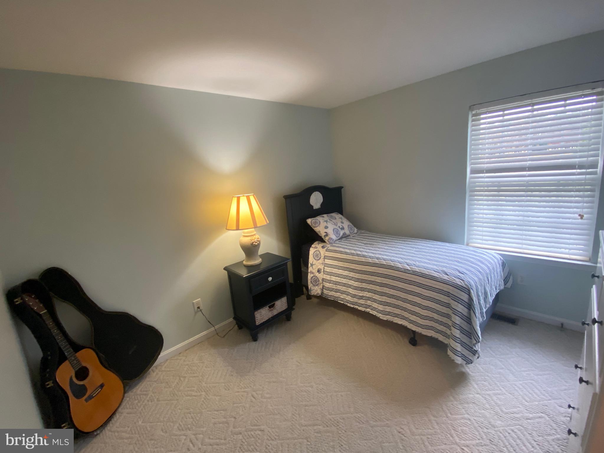 13 Fairway Avenue Georgetown, DE 19947 - Photo 5 of 37 a bedroom with a bed and a window