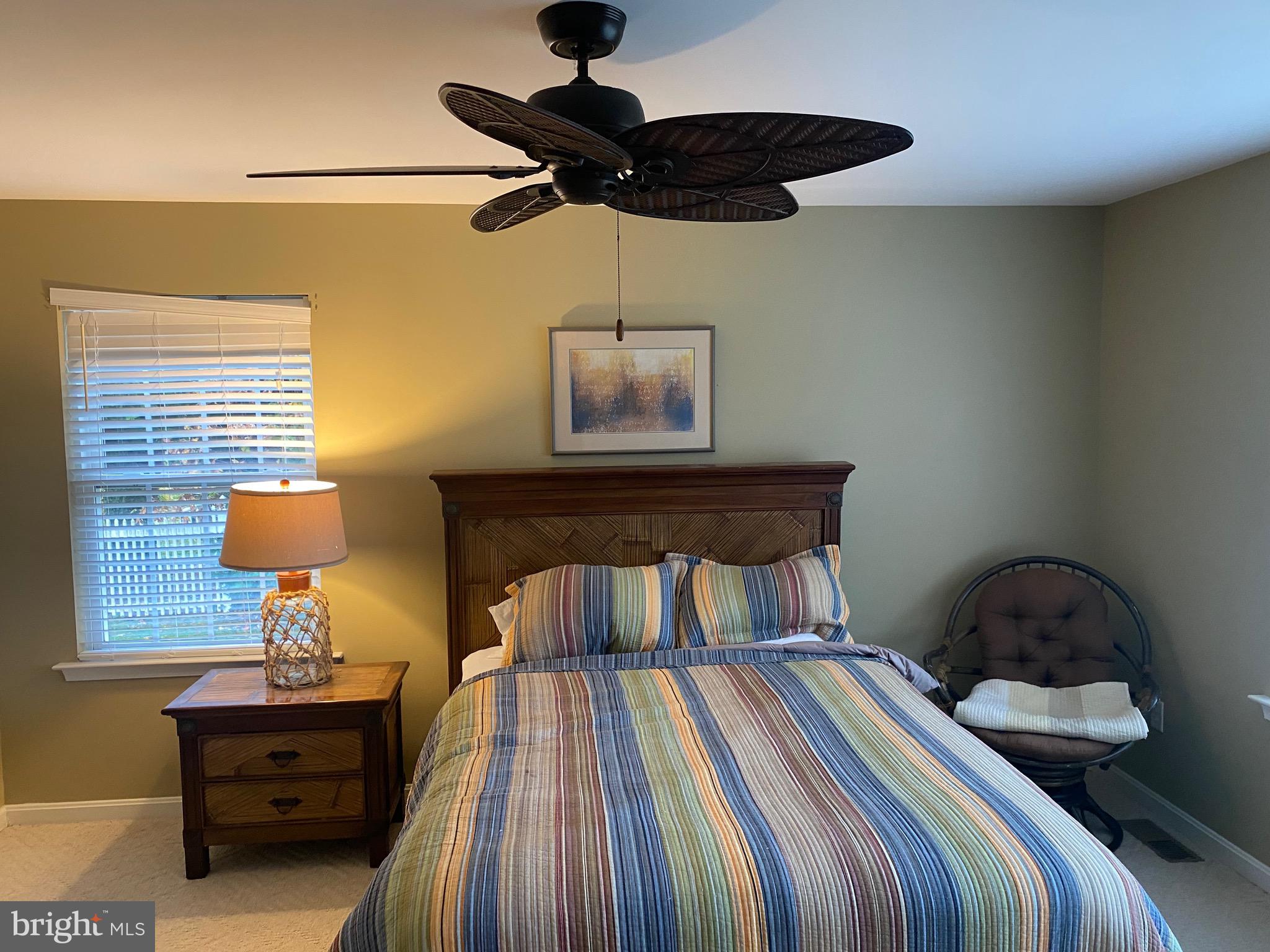13 Fairway Avenue Georgetown, DE 19947 - Photo 10 of 37 a bedroom with a bed and wooden floor