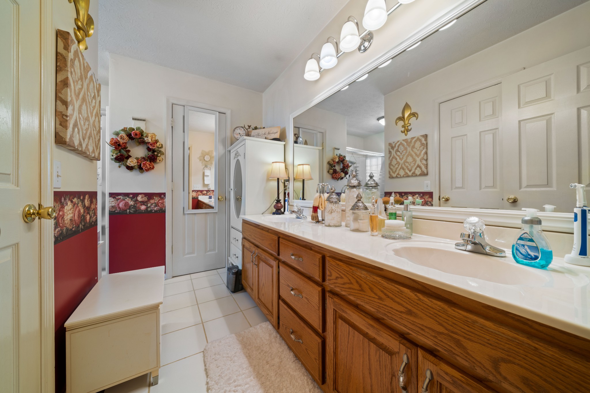 425 Fowler Ford Road Portland, TN 37148 - Photo 21 of 40 a spacious bathroom with a sink double vanity and a mirror