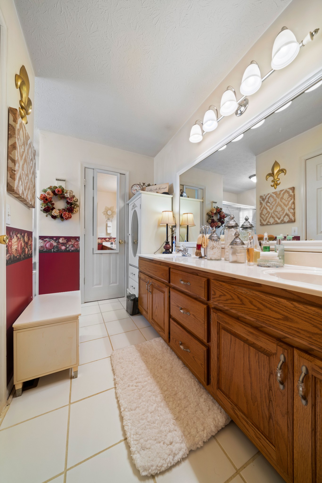 425 Fowler Ford Road Portland, TN 37148 - Photo 24 of 40 a spacious bathroom with a sink a mirror and a double vanity