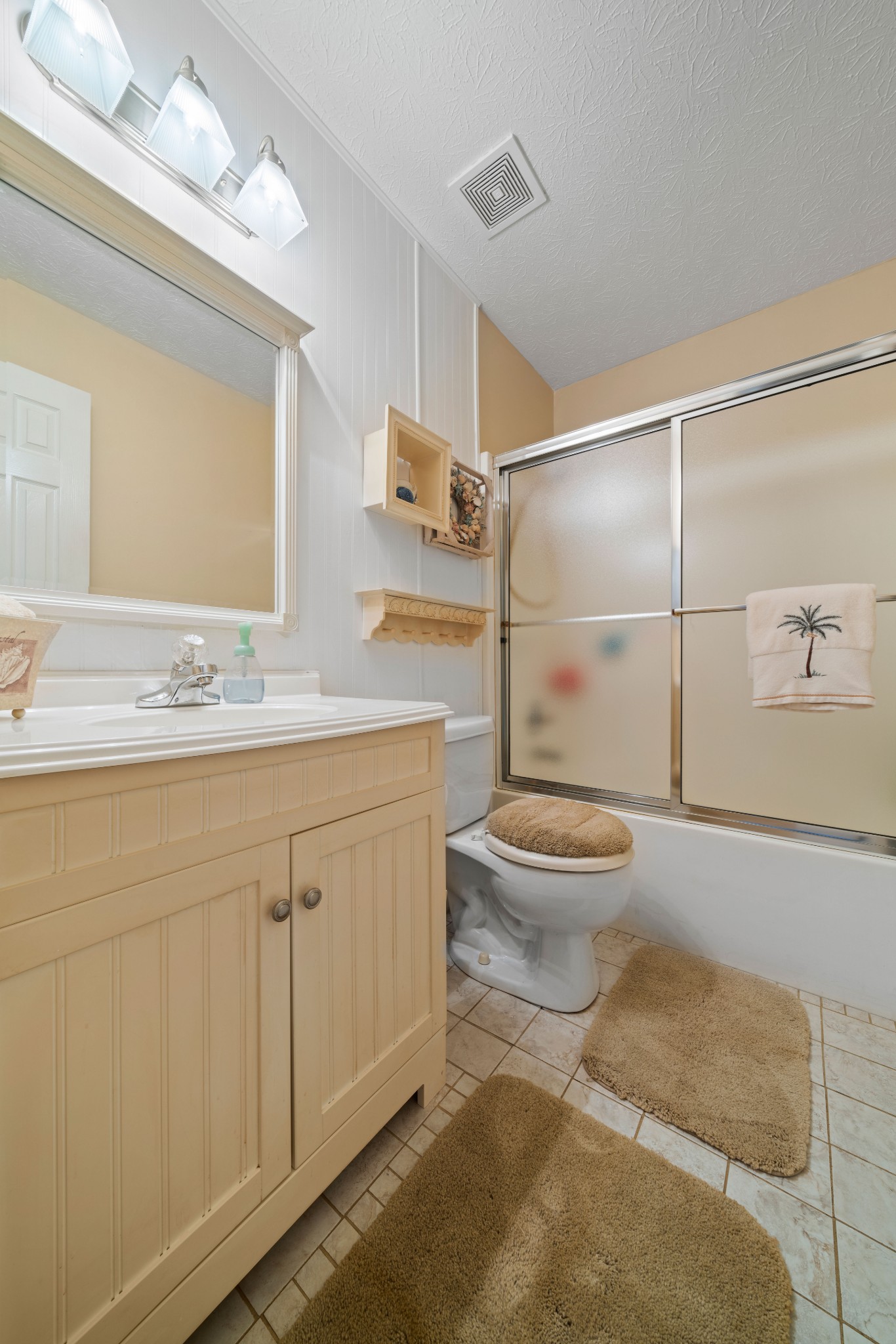 425 Fowler Ford Road Portland, TN 37148 - Photo 27 of 40 a bathroom with a granite countertop sink toilet and shower