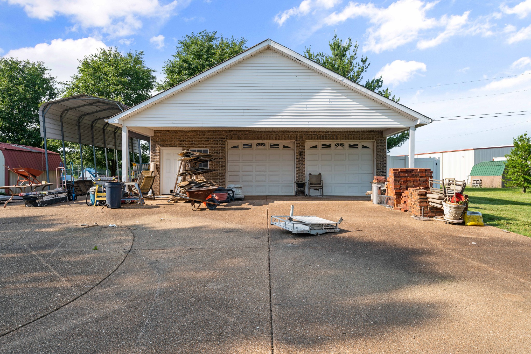 425 Fowler Ford Road Portland, TN 37148 - Photo 28 of 40 a view of a house with sitting area and roof